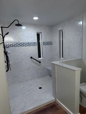 A bathroom with a walk-in shower, toilet and sink before doors added - bathroom remodeling and renovation from Oasis Bath Solutions of Kent Washington